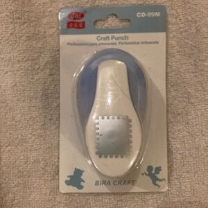 Postage stamp paper punch